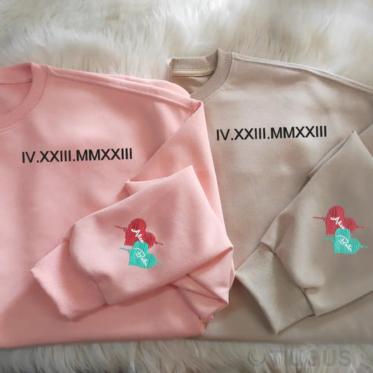 Customized Roman Numeral Embroidered Sweatshirts For Couples With The Names On Cuffs.